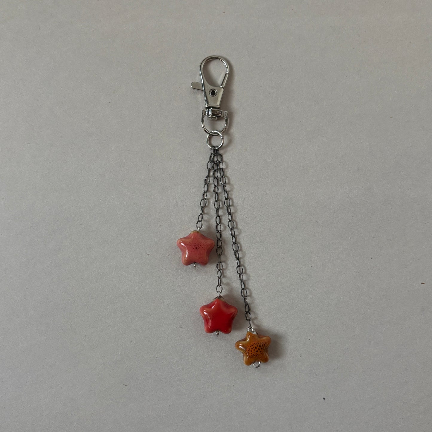 red ceramic star keychain