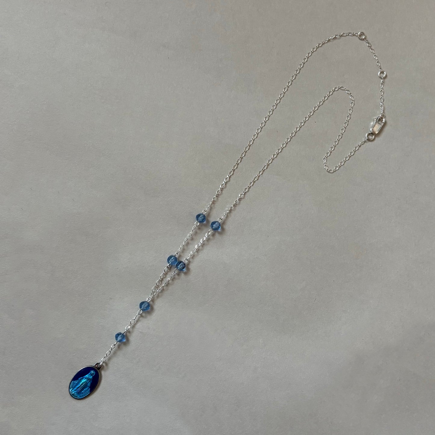 blue idol necklace