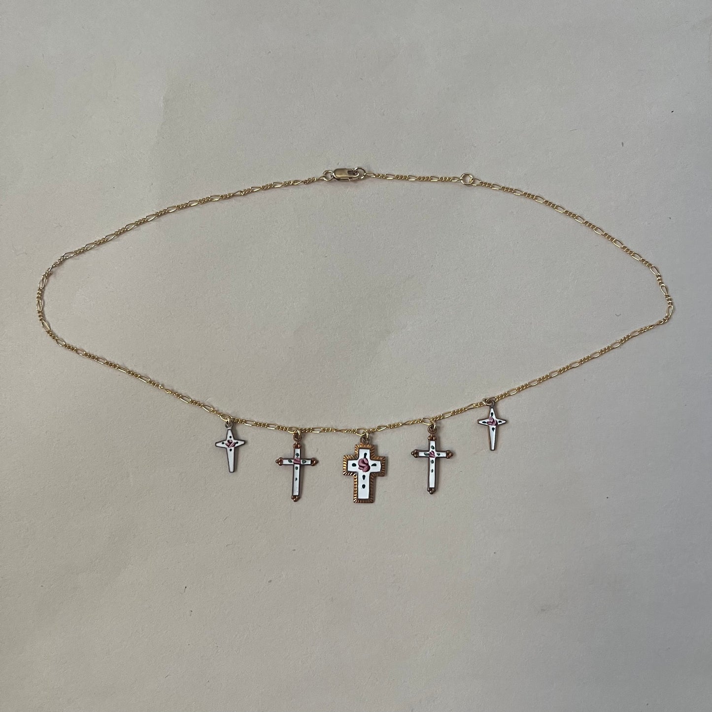 dolly cross necklace