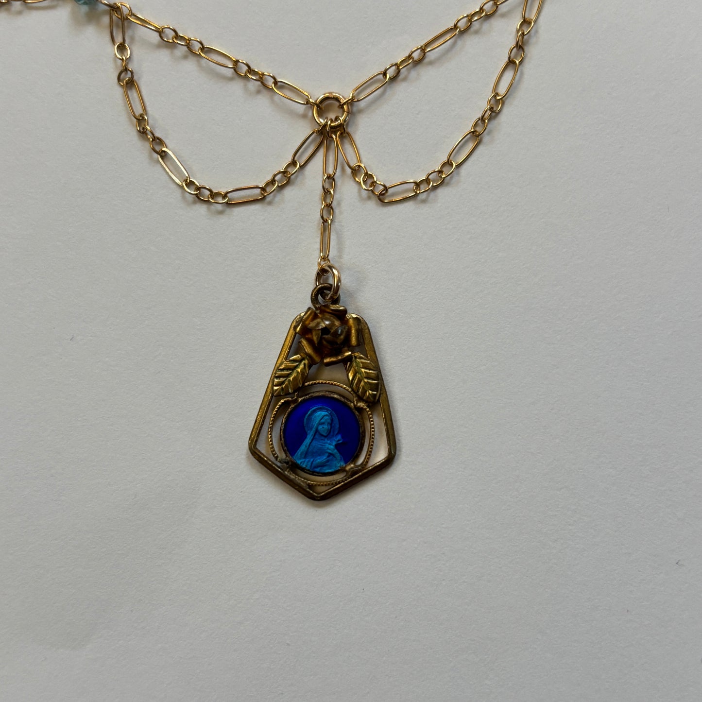 blue curtain necklace