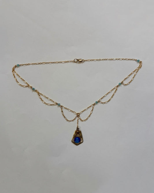 blue curtain necklace