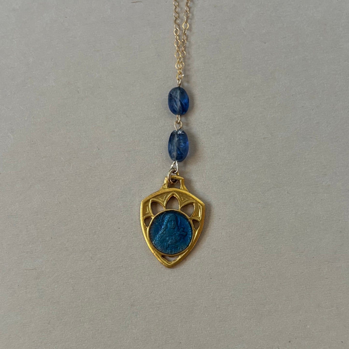 blue sigil necklace
