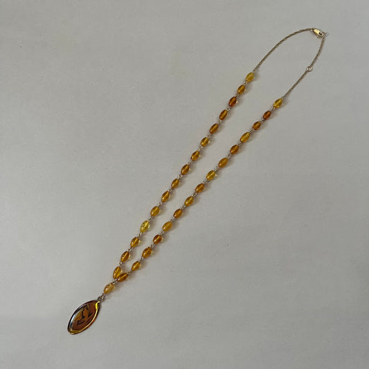 amber mary necklace