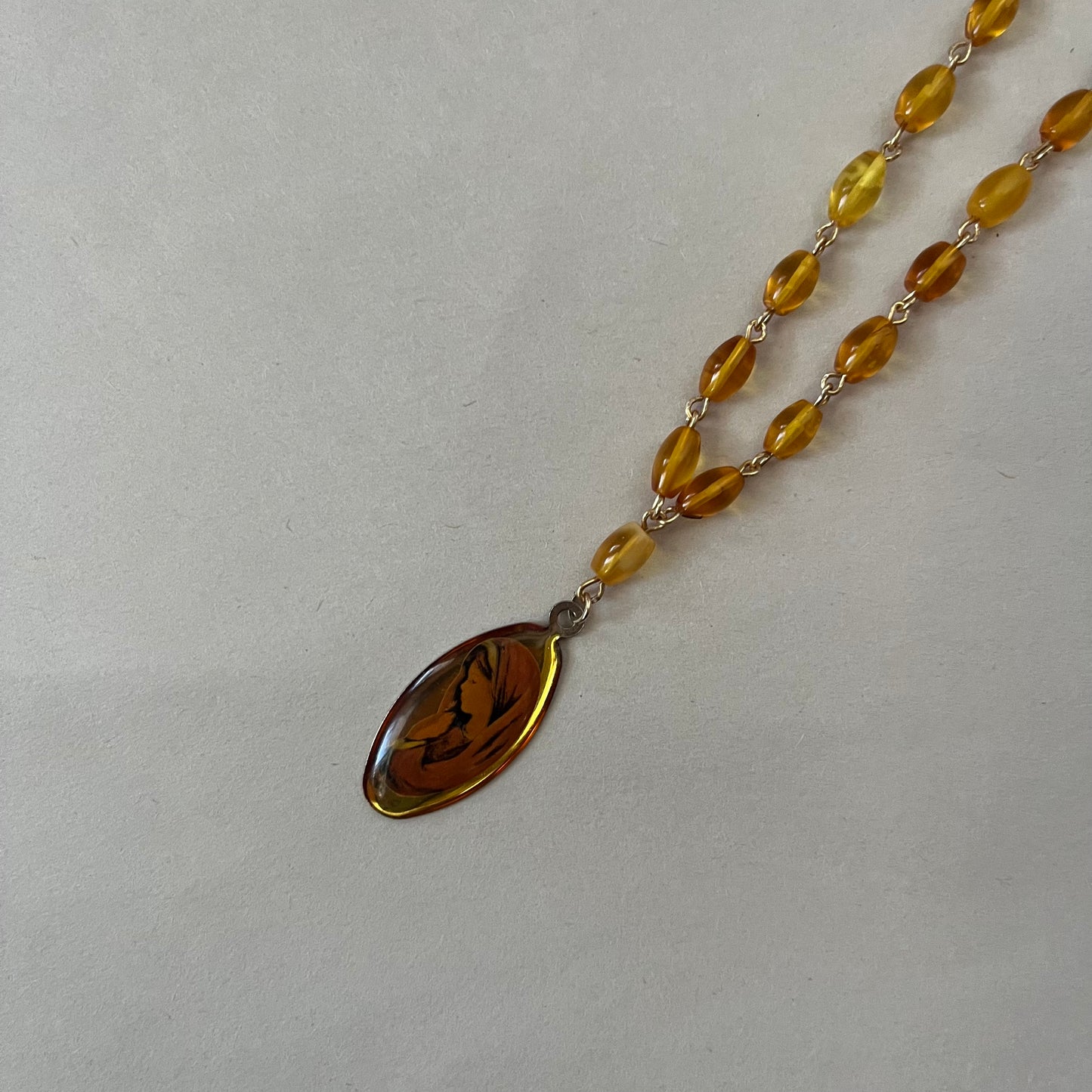 amber mary necklace