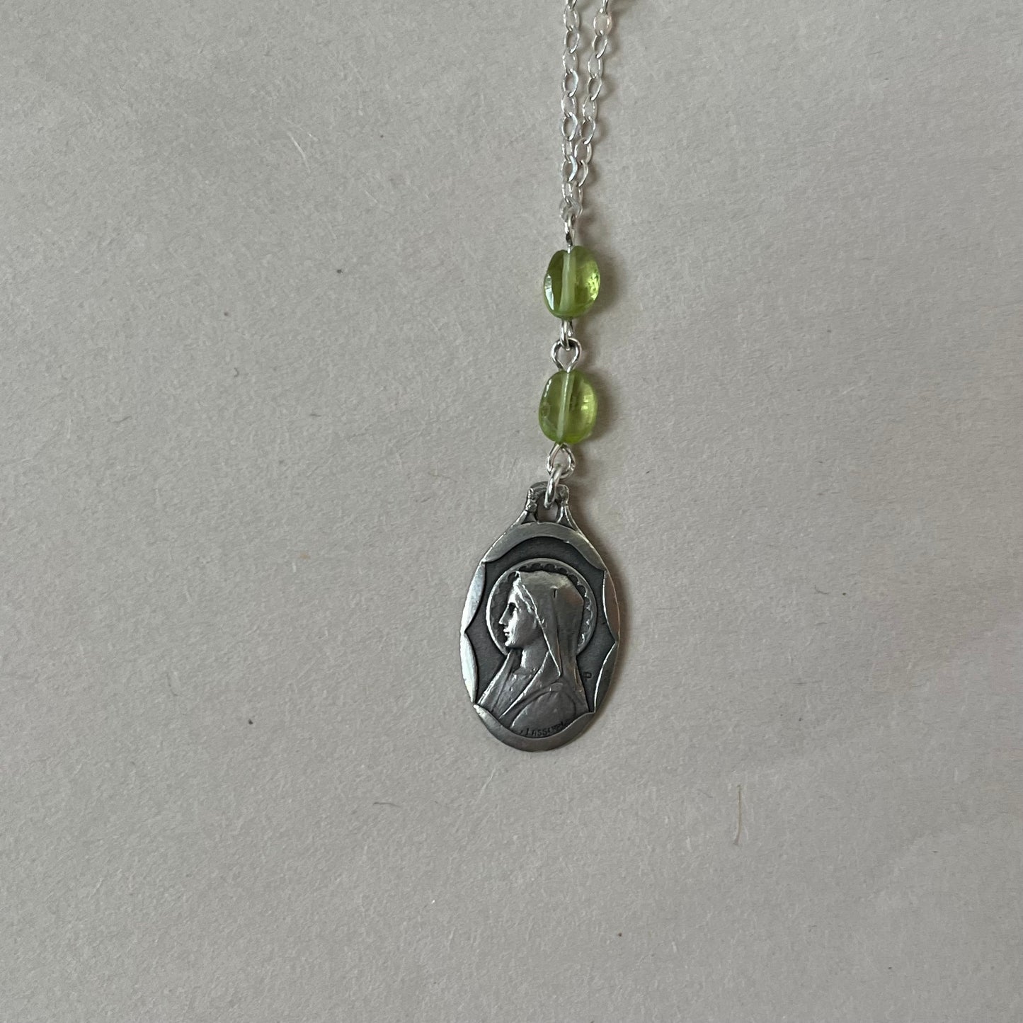 peridot mary necklace