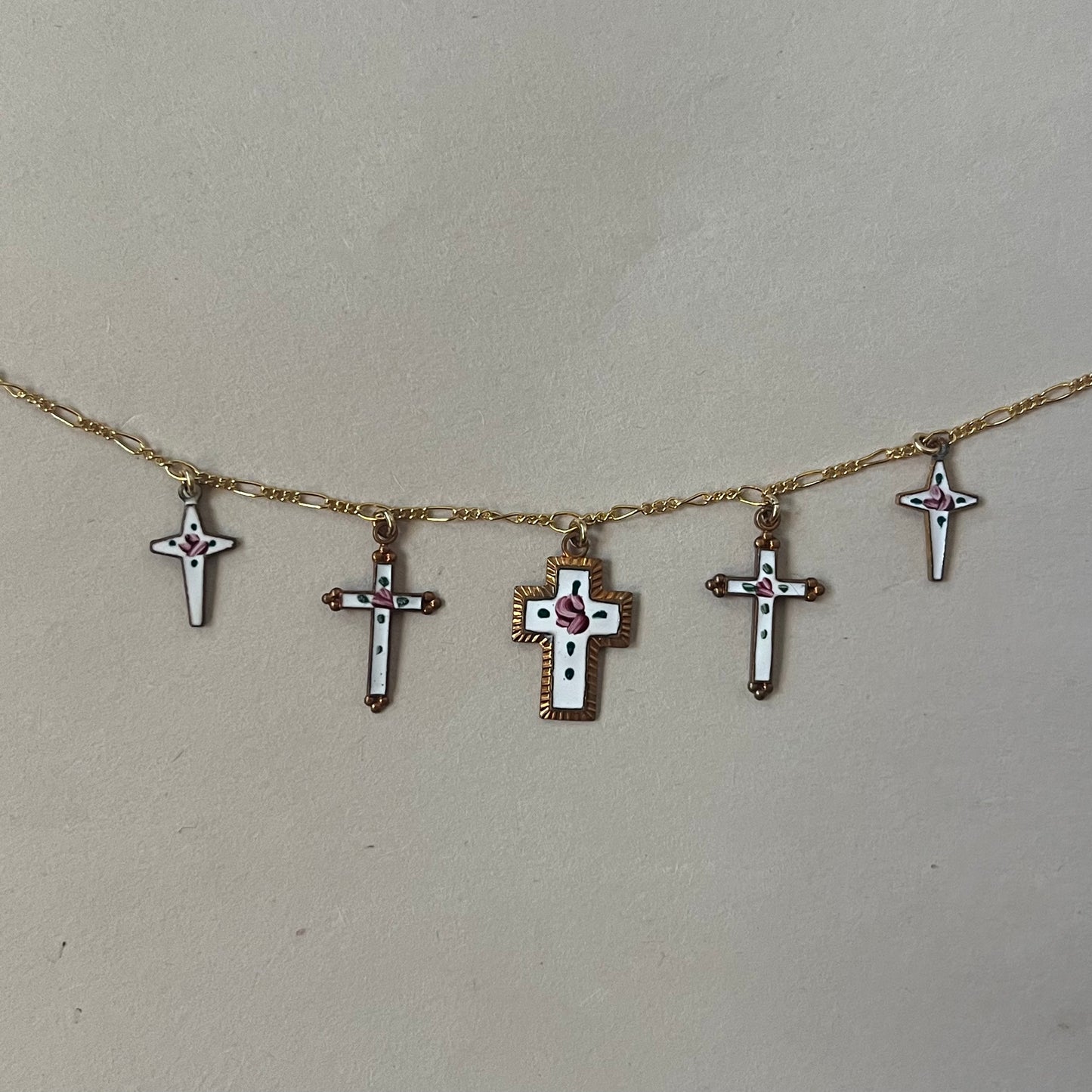 dolly cross necklace